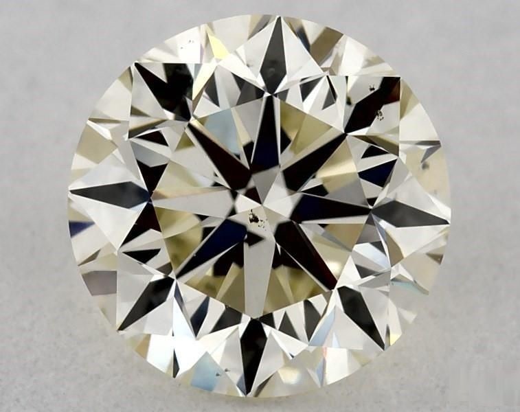 Loose Diamond - ROUND 0.93ct O-P VS2: Loose Diamond - ROUND 0.93ct O-P VS2 Source: Natural Shape: ROUND Carats: 0.93 Color: O-P Certification: GIA The Diamond Depot Guarantee: All items in this auction are guaranteed to be 100% authentic.