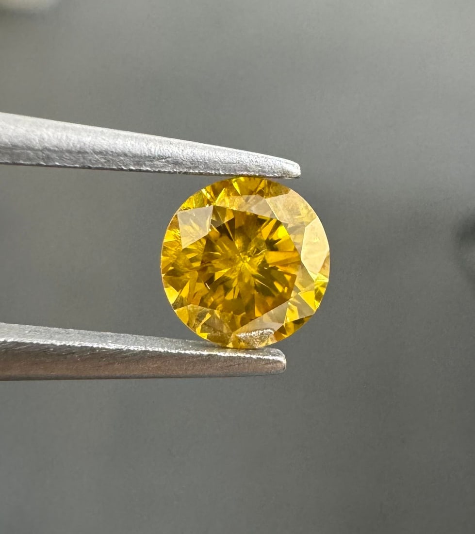 Loose Diamond - ROUND 0.41ct Fancy Deep Brownish Orangey Yellow I2: Loose Diamond - ROUND 0.41ct Fancy Deep Brownish Orangey Yellow I2 Source: Natural Shape: ROUND Carats: 0.41 Color: Fancy Deep Brownish Orangey Yellow Certification: GIA Video: