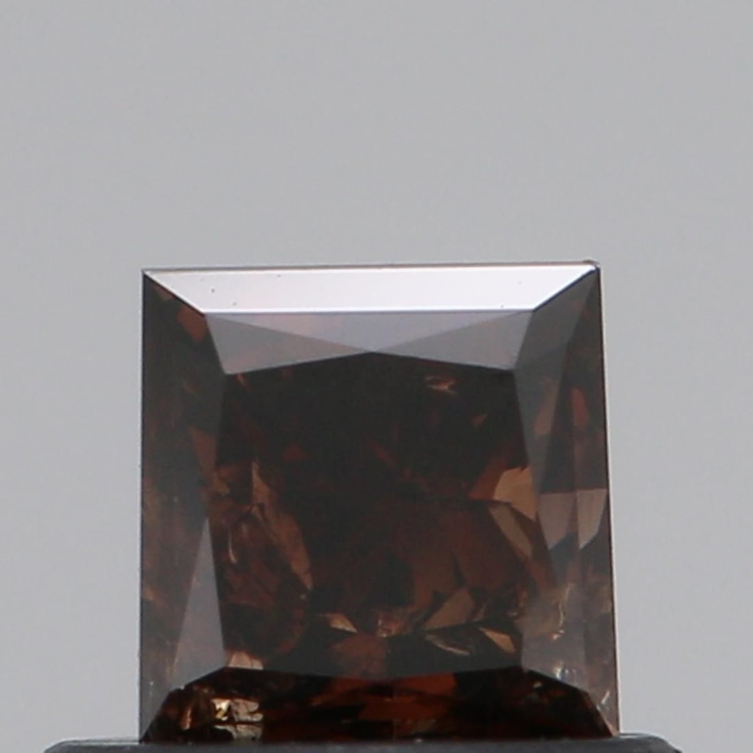 Loose Diamond - PRINCESS 0.59ct Fancy Dark Brown SI2: Loose Diamond - PRINCESS 0.59ct Fancy Dark Brown SI2 Source: Natural Shape: PRINCESS Carats: 0.59 Color: Fancy Dark Brown Certification: NONE Video: