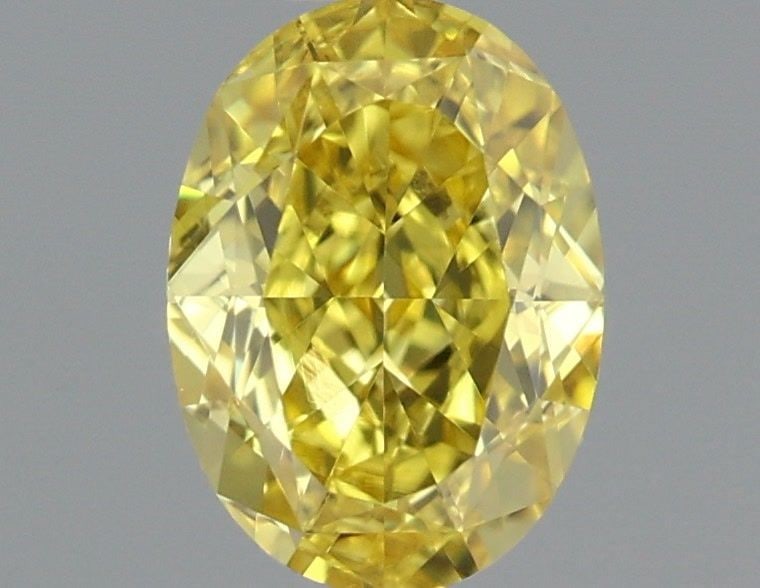 Loose Diamond - OVAL 0.7ct Fancy Vivid Yellow VS2: Loose Diamond - OVAL 0.7ct Fancy Vivid Yellow VS2 Source: Natural Shape: OVAL Carats: 0.7 Color: Fancy Vivid Yellow Certification: GIA Video: