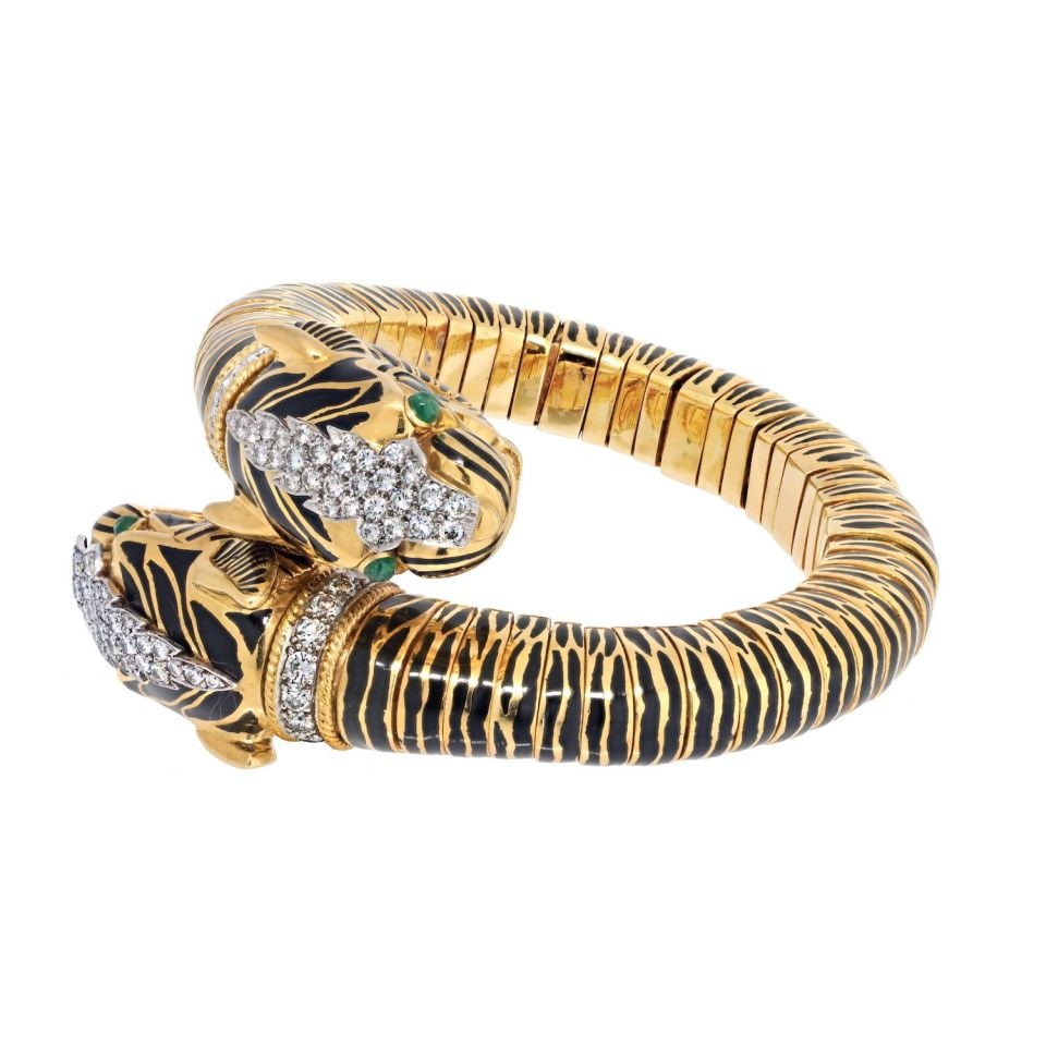 David Webb Tiger Bracelet Platinum 18K Yellow Gold Enamel Diamond Accents: David Webb Tiger Bracelet Platinum 18K Yellow Gold Enamel Diamond Accents Experience the wild elegance of the David Webb Kingdom Collection with this stunning double head tiger bracelet. Crafted from