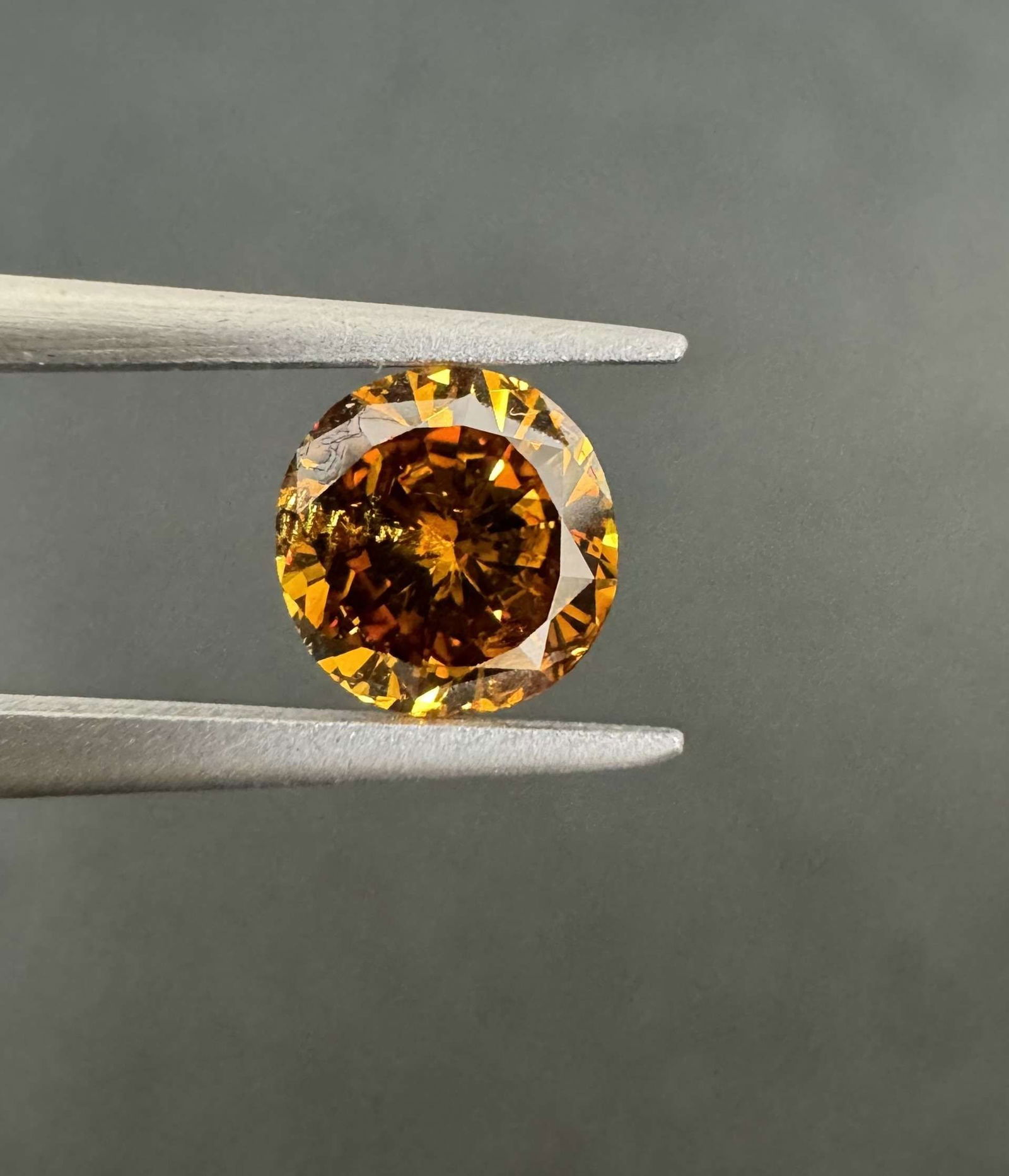 Loose Diamond - ROUND 1.02ct Fancy Deep Brown Orange I2: Loose Diamond - ROUND 1.02ct Fancy Deep Brown Orange I2 Source: Natural Shape: ROUND Carats: 1.02 Color: Fancy Deep Brown Orange Certification: GIA Video: