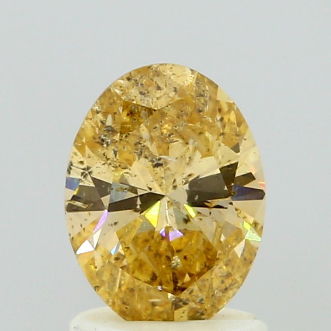 Loose Diamond - OVAL 1.08ct Fancy Intense Yellow Orange I1: Loose Diamond - OVAL 1.08ct Fancy Intense Yellow Orange I1 Source: Natural Shape: OVAL Carats: 1.08 Color: Fancy Intense Yellow Orange Certification: GIA Video: