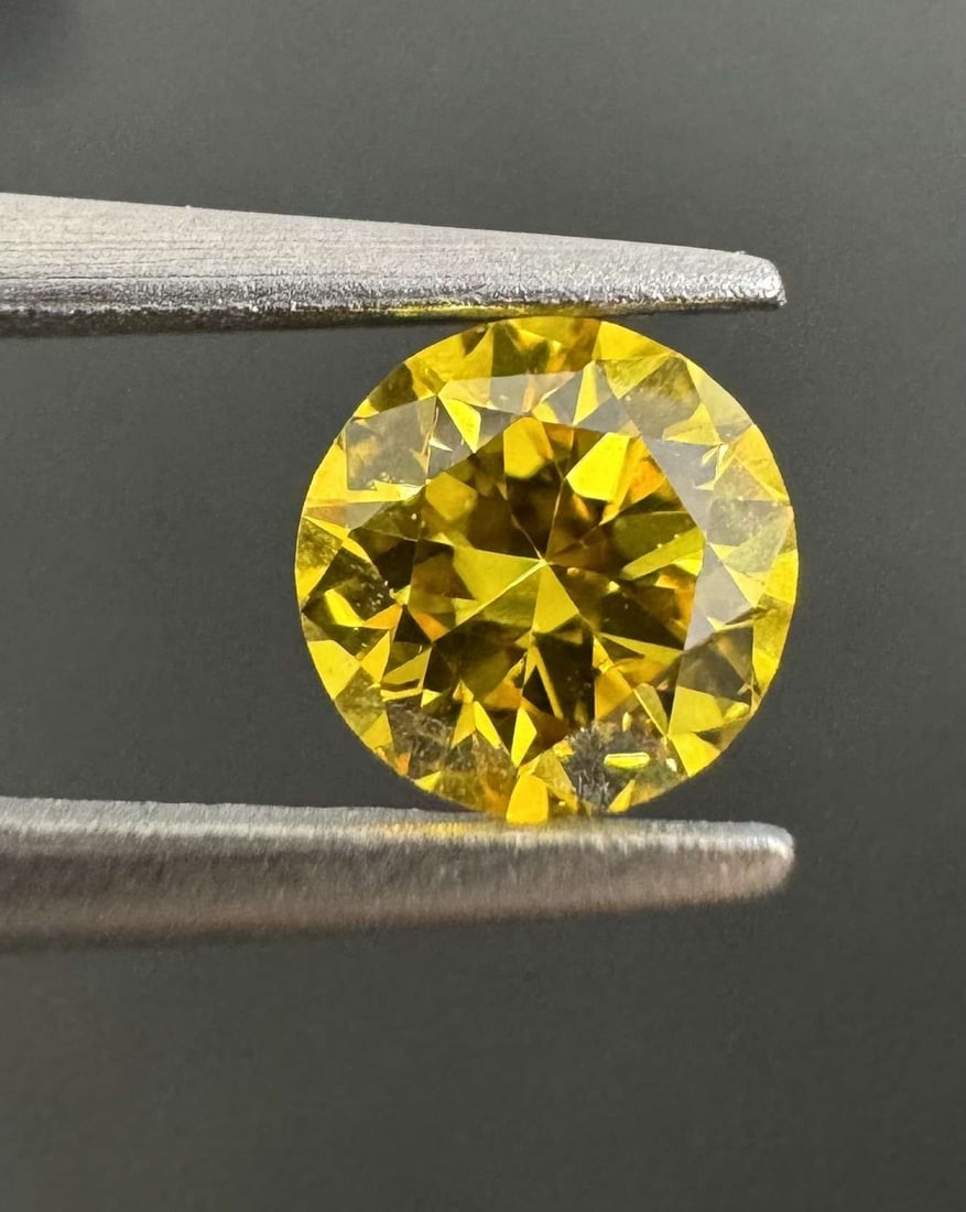 Loose Diamond - ROUND 0.23ct Fancy Vivid Orangey Yellow SI2: Loose Diamond - ROUND 0.23ct Fancy Vivid Orangey Yellow SI2 Source: Natural Shape: ROUND Carats: 0.23 Color: Fancy Vivid Orangey Yellow Certification: GIA Video: