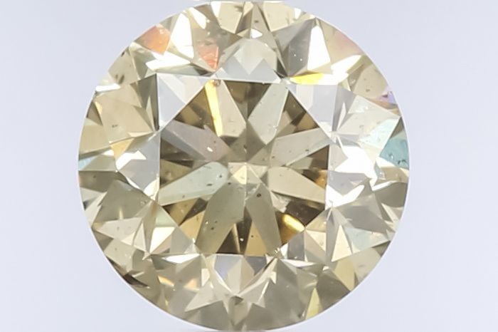 Loose Diamond - ROUND 0.71ct Fancy Dark Yellow Brown: Loose Diamond - ROUND 0.71ct Fancy Dark Yellow Brown Source: Natural Shape: ROUND Carats: 0.71 Color: Fancy Dark Yellow Brown Certification: GIA Video: