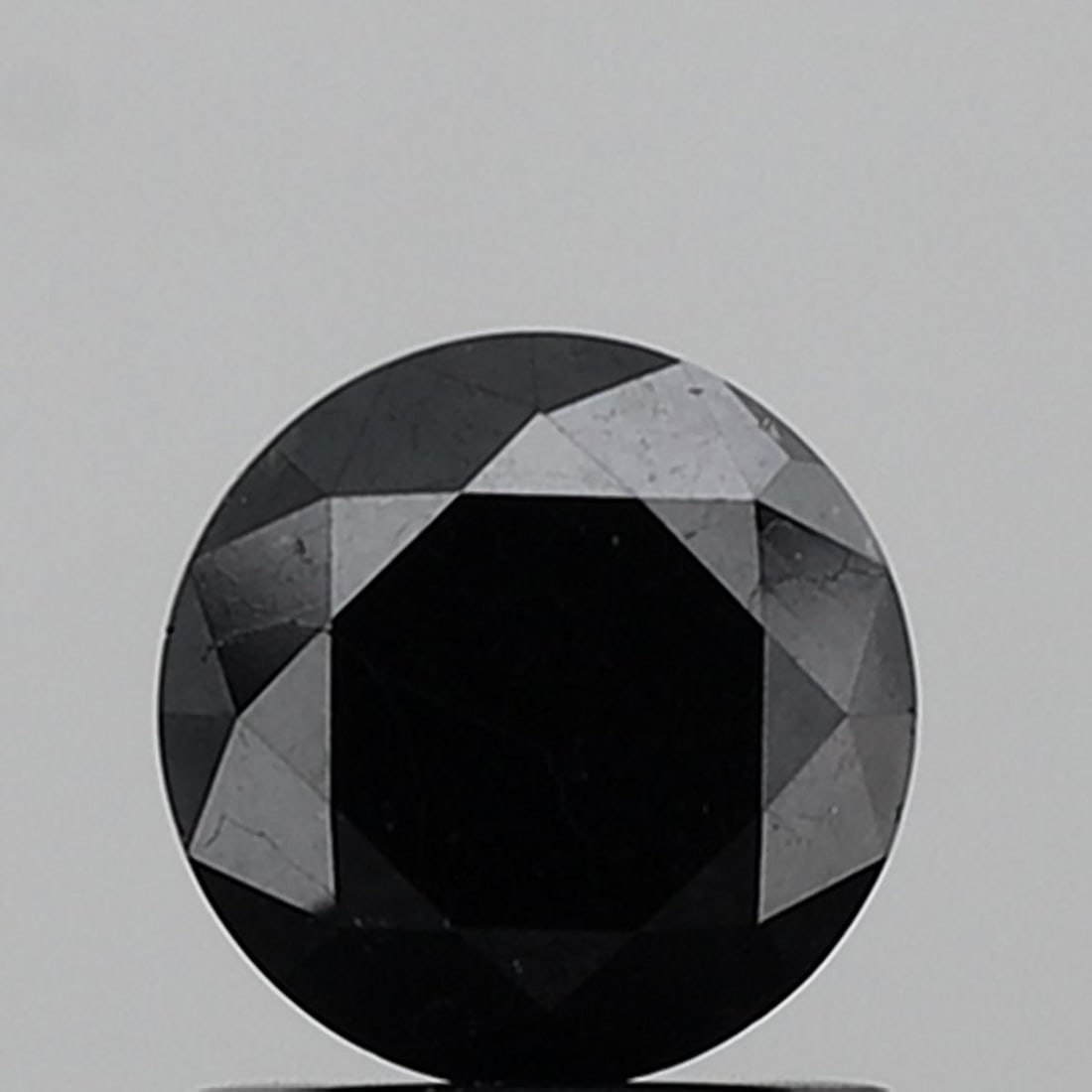 Loose Diamond - ROUND 1.22ct Fancy Black VVS2: Loose Diamond - ROUND 1.22ct Fancy Black VVS2 Source: Natural Shape: ROUND Carats: 1.22 Color: Fancy Black Certification: NONE Video: