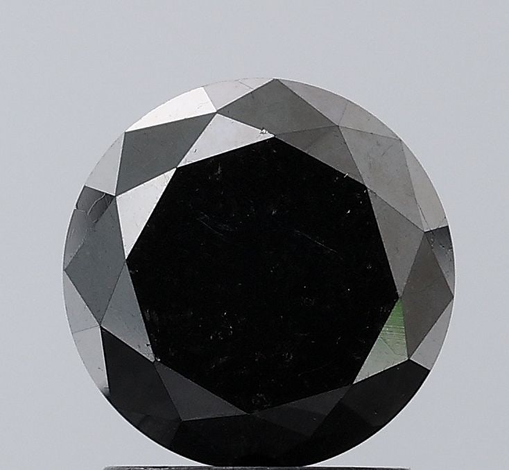 Loose Diamond - ROUND 1.73ct Fancy Black VS1: Loose Diamond - ROUND 1.73ct Fancy Black VS1 Source: Natural Shape: ROUND Carats: 1.73 Color: Fancy Black Certification: NONE Video: