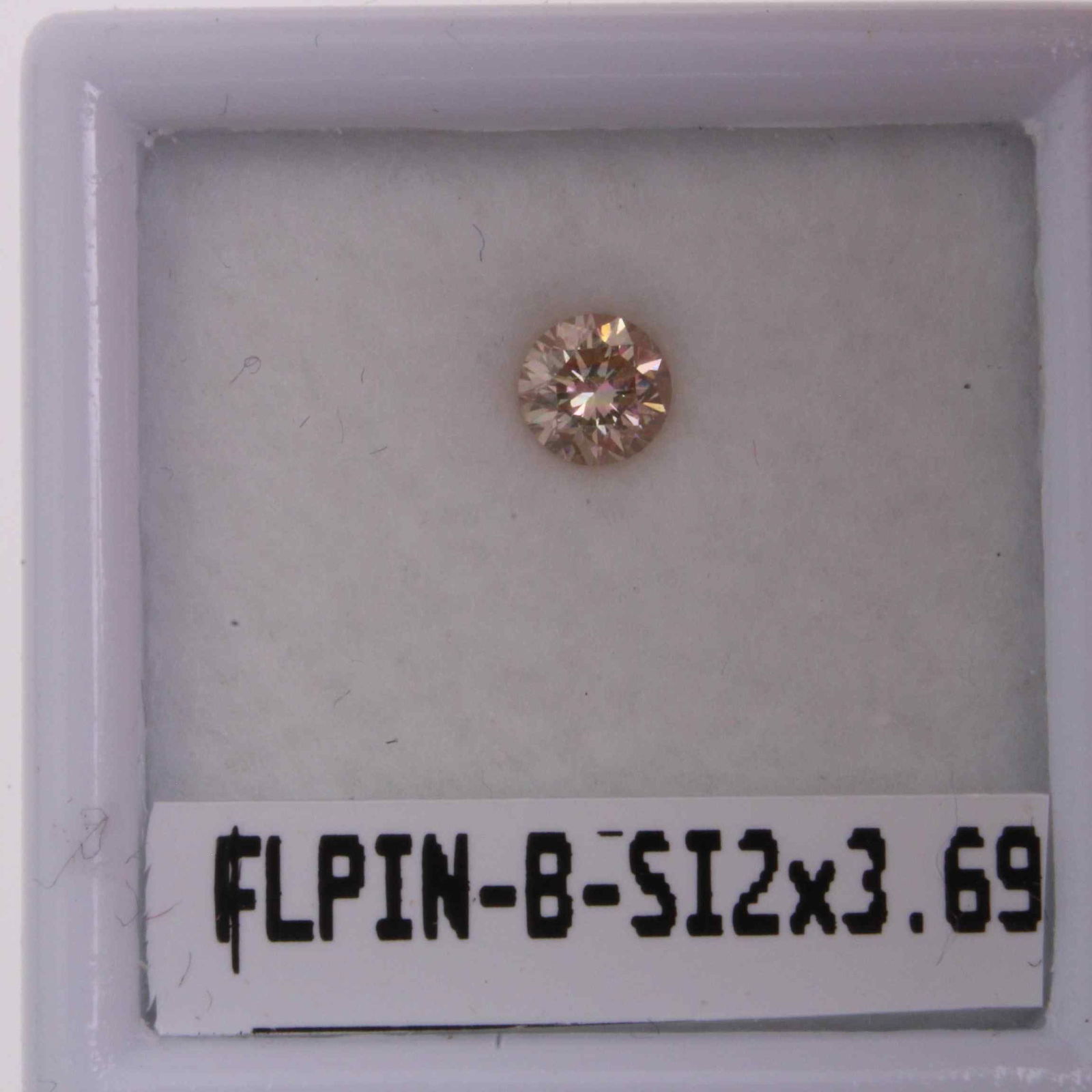 Loose Diamond - ROUND 0.2ct Brown SI2: Loose Diamond - ROUND 0.2ct Brown SI2 Source: Natural Shape: ROUND Carats: 0.2 Color: Brown Certification: GIA The Diamond Depot Guarantee: All items in this auction are guaranteed to be 100% authenti