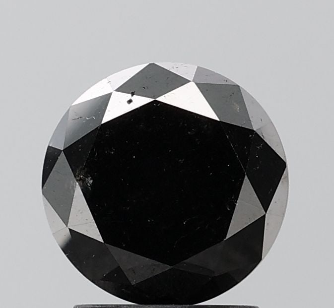 Loose Diamond - ROUND 2.28ct Black VS1: Loose Diamond - ROUND 2.28ct Black VS1 Source: Natural Shape: ROUND Carats: 2.28 Color: Black Certification: NONE Video: