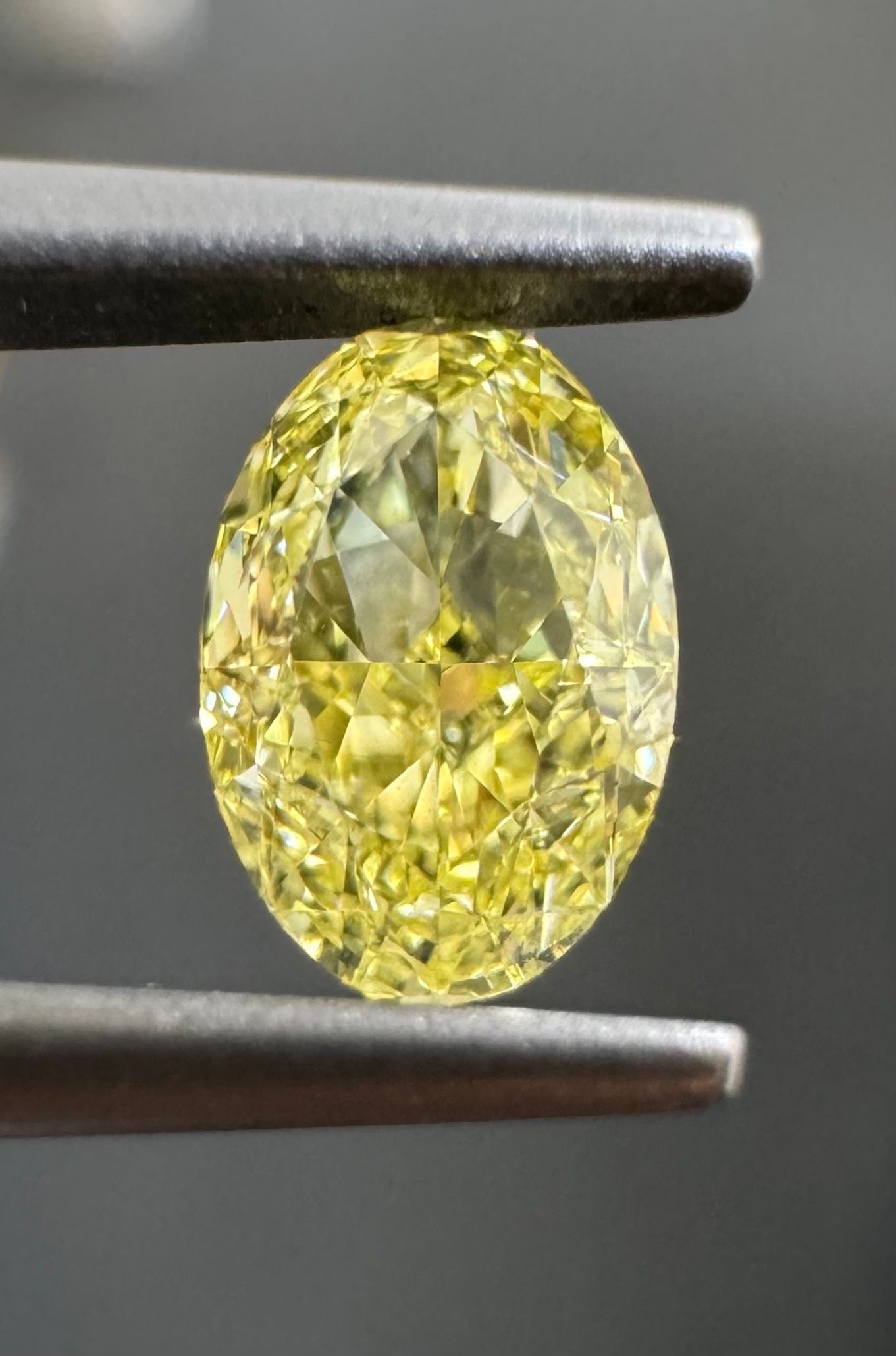 Loose Diamond - OVAL 0.51ct Fancy Yellow VS2: Loose Diamond - OVAL 0.51ct Fancy Yellow VS2 Source: Natural Shape: OVAL Carats: 0.51 Color: Fancy Yellow Certification: GIA The Diamond Depot Guarantee: All items in this auction are guaranteed to be