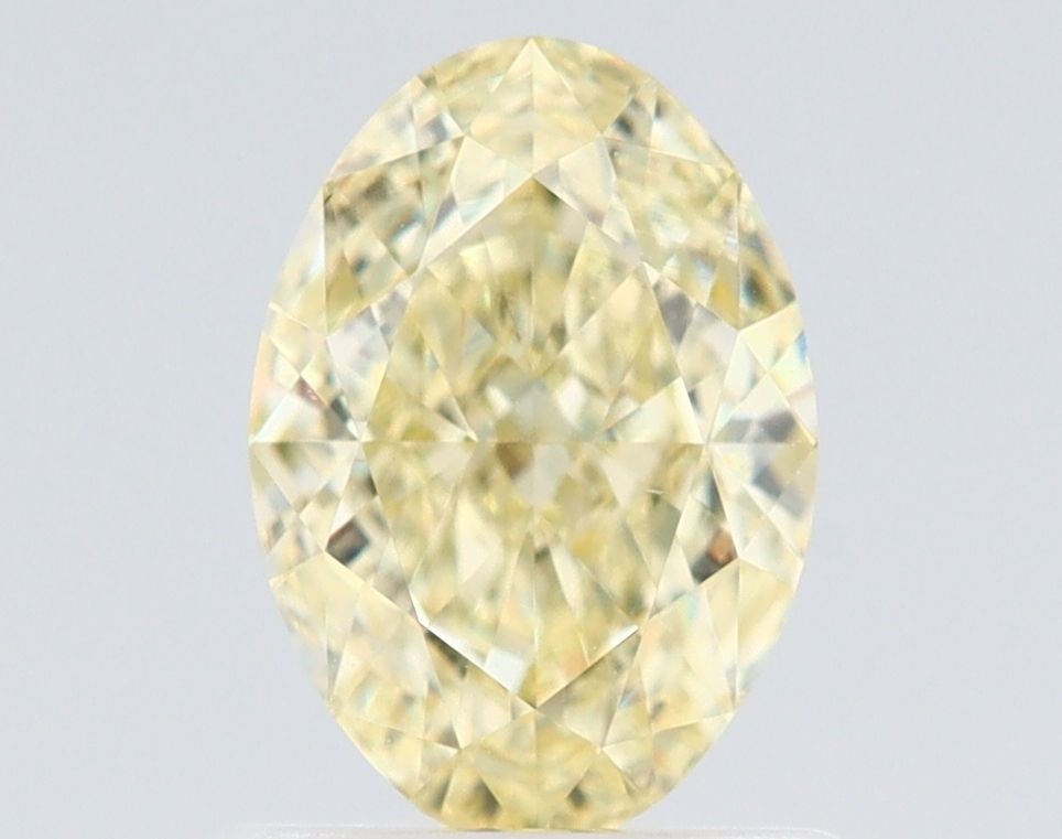 Loose Diamond - OVAL 1.01ct Fancy Light Yellow VS2: Loose Diamond - OVAL 1.01ct Fancy Light Yellow VS2 Source: Natural Shape: OVAL Carats: 1.01 Color: Fancy Light Yellow Certification: GIA Video:
