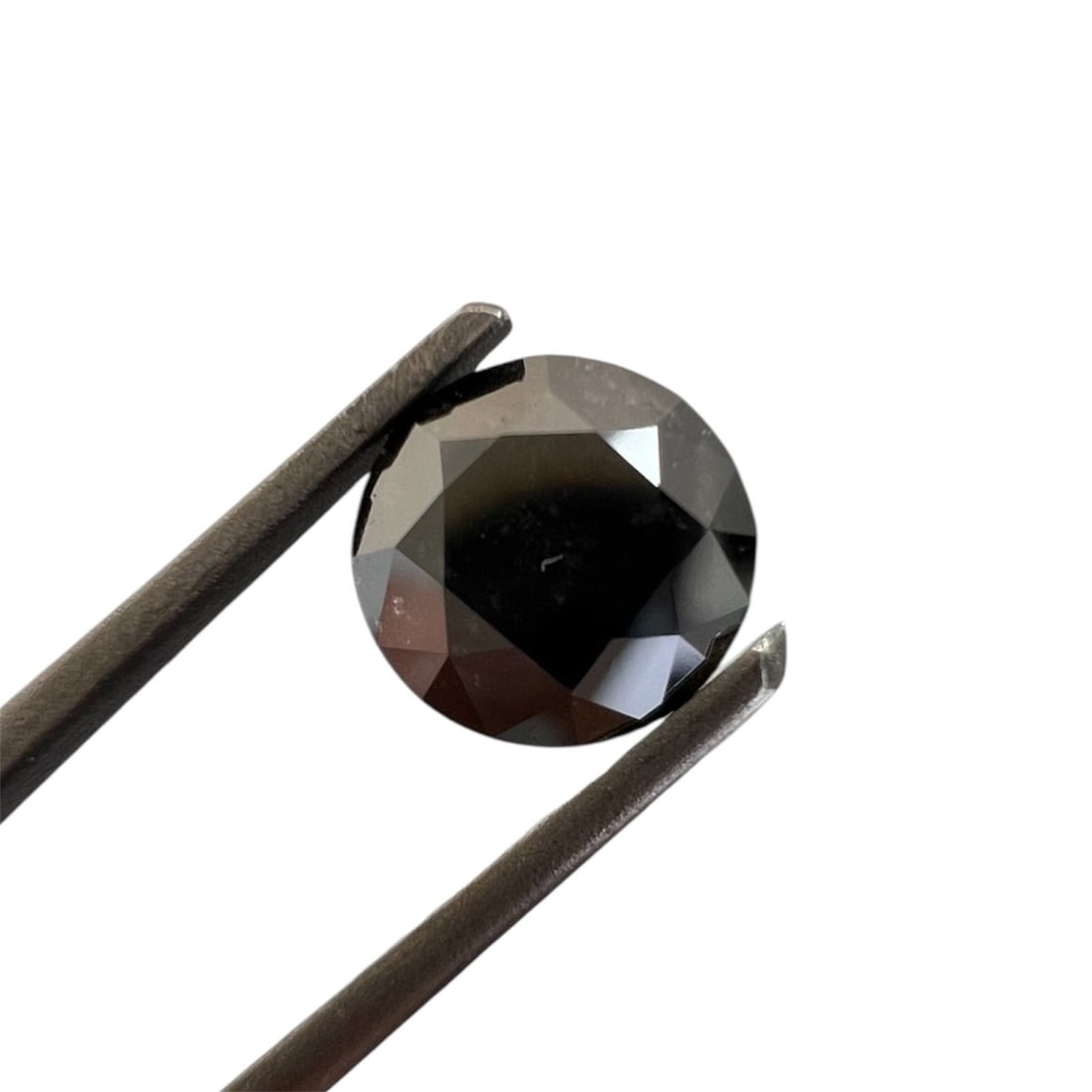 Loose Diamond - ROUND 1.12ct Fancy Black: Loose Diamond - ROUND 1.12ct Fancy Black Source: Natural Shape: ROUND Carats: 1.12 Color: Fancy Black Certification: GIA The Diamond Depot Guarantee: All items in this auction are guaranteed to be 100