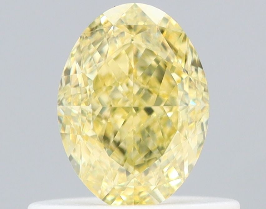 Loose Diamond - OVAL 0.61ct Fancy Yellow VVS2: Loose Diamond - OVAL 0.61ct Fancy Yellow VVS2 Source: Natural Shape: OVAL Carats: 0.61 Color: Fancy Yellow Certification: GIA Video: