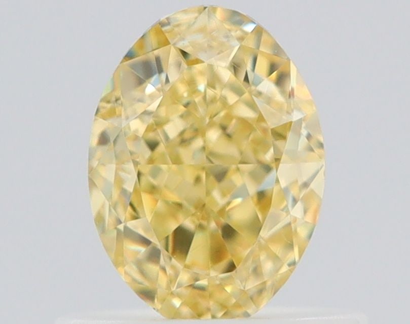 Loose Diamond - OVAL 0.7ct Fancy Yellow VS2: Loose Diamond - OVAL 0.7ct Fancy Yellow VS2 Source: Natural Shape: OVAL Carats: 0.7 Color: Fancy Yellow Certification: GIA Video: