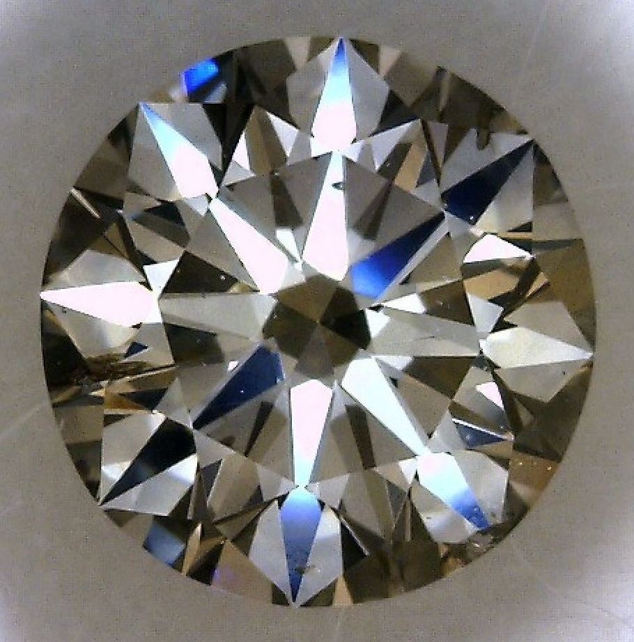 Loose Diamond - ROUND 0.75ct Fancy Gray I1: Loose Diamond - ROUND 0.75ct Fancy Gray I1 Source: Natural Shape: ROUND Carats: 0.75 Color: Fancy Gray Certification: GIA The Diamond Depot Guarantee: All items in this auction are guaranteed to be 10