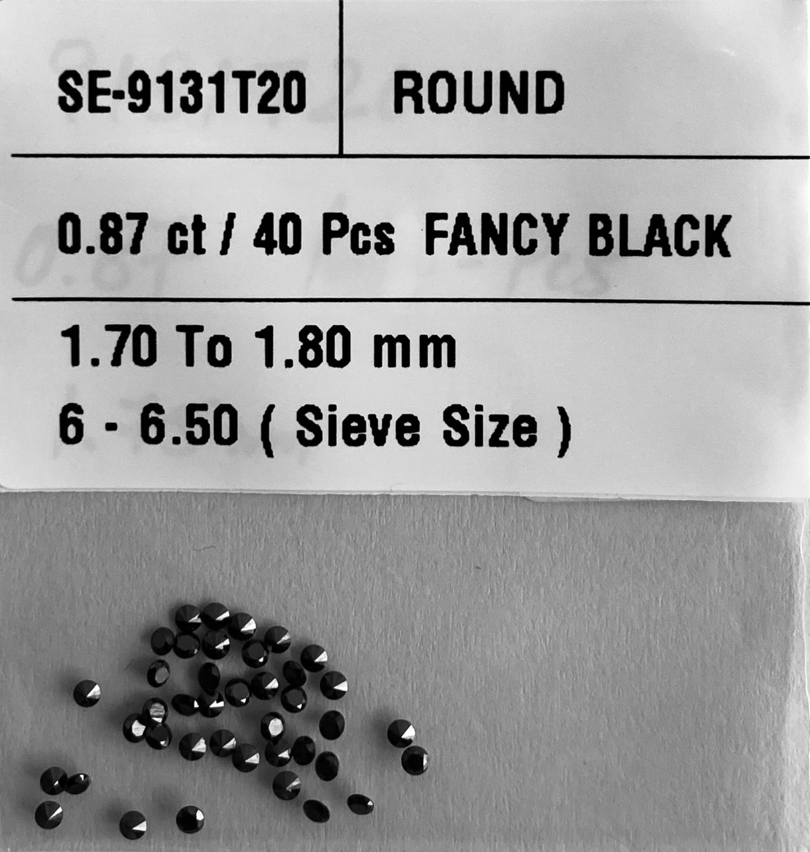 Loose Diamond - ROUND 0.87ct Fancy Black VVS2: Loose Diamond - ROUND 0.87ct Fancy Black VVS2 Source: Natural Shape: ROUND Carats: 0.87 Color: Fancy Black Certification: NONE The Diamond Depot Guarantee: All items in this auction are guaranteed to