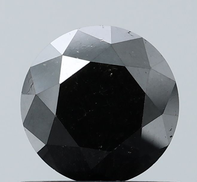 Loose Diamond - ROUND 0.93ct Fancy Black VS2: Loose Diamond - ROUND 0.93ct Fancy Black VS2 Source: Natural Shape: ROUND Carats: 0.93 Color: Fancy Black Certification: NONE Video:
