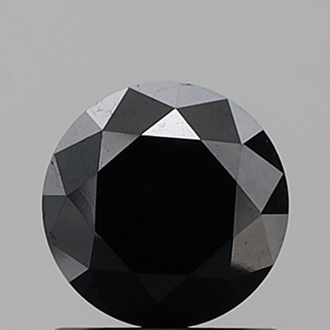 Loose Diamond - ROUND 1.26ct Black VVS2: Loose Diamond - ROUND 1.26ct Black VVS2 Source: Natural Shape: ROUND Carats: 1.26 Color: Black Certification: NONE Video: