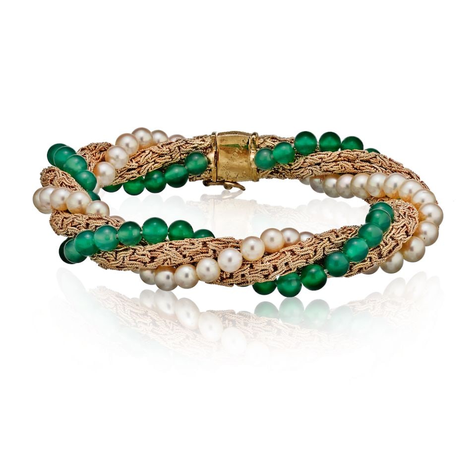 Bvlgari 18K Yellow Gold Torsade Bracelet with Chrysoprase and Pearls: Bvlgari 18K Yellow Gold Torsade Bracelet with Chrysoprase and Pearls This exquisite Bvlgari bracelet features a stunning torsade design crafted from luxurious 18K yellow gold. Adorned with vibrant chr