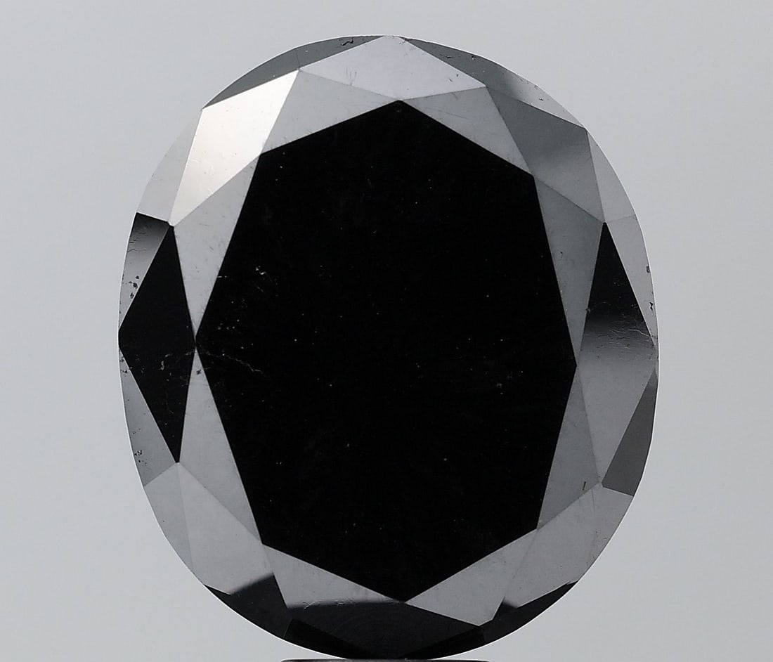 Loose Diamond - OVAL 16.37ct Black VS2: Loose Diamond - OVAL 16.37ct Black VS2 Source: Natural Shape: OVAL Carats: 16.37 Color: Black Certification: NONE Video:
