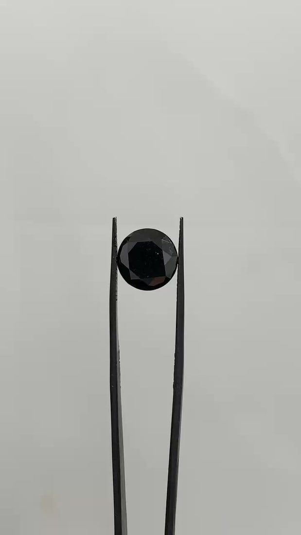 Loose Diamond - ROUND 5.98ct Fancy Black VVS2: Loose Diamond - ROUND 5.98ct Fancy Black VVS2 Source: Natural Shape: ROUND Carats: 5.98 Color: Fancy Black Certification: GIA Video: