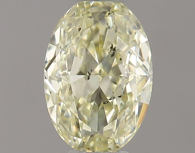 Loose Diamond - OVAL 0.41ct Fancy Light Yellow SI1: Loose Diamond - OVAL 0.41ct Fancy Light Yellow SI1 Source: Natural Shape: OVAL Carats: 0.41 Color: Fancy Light Yellow Certification: NONE Video: