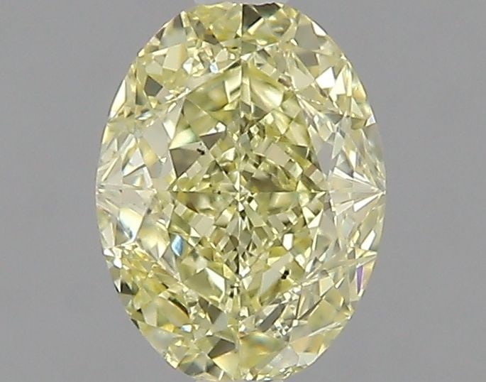 Loose Diamond - OVAL 0.91ct Fancy Yellow SI1: Loose Diamond - OVAL 0.91ct Fancy Yellow SI1 Source: Natural Shape: OVAL Carats: 0.91 Color: Fancy Yellow Certification: GIA Video: