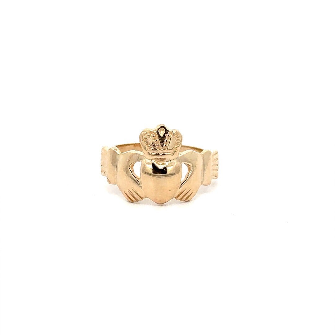 14k Yellow Gold Heart Claddagh Friendship Band Ring Size 5.5: 14k Yellow Gold Heart Claddagh Friendship Band Ring Size 5.5 This exquisite 14k Yellow Gold High Polished Heart Claddagh Irish Friendship Band Ring beautifully symbolizes love and friendship. Crafted