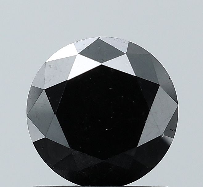Loose Diamond - ROUND 1.36ct Black VVS2: Loose Diamond - ROUND 1.36ct Black VVS2 Source: Natural Shape: ROUND Carats: 1.36 Color: Black Certification: NONE Video: