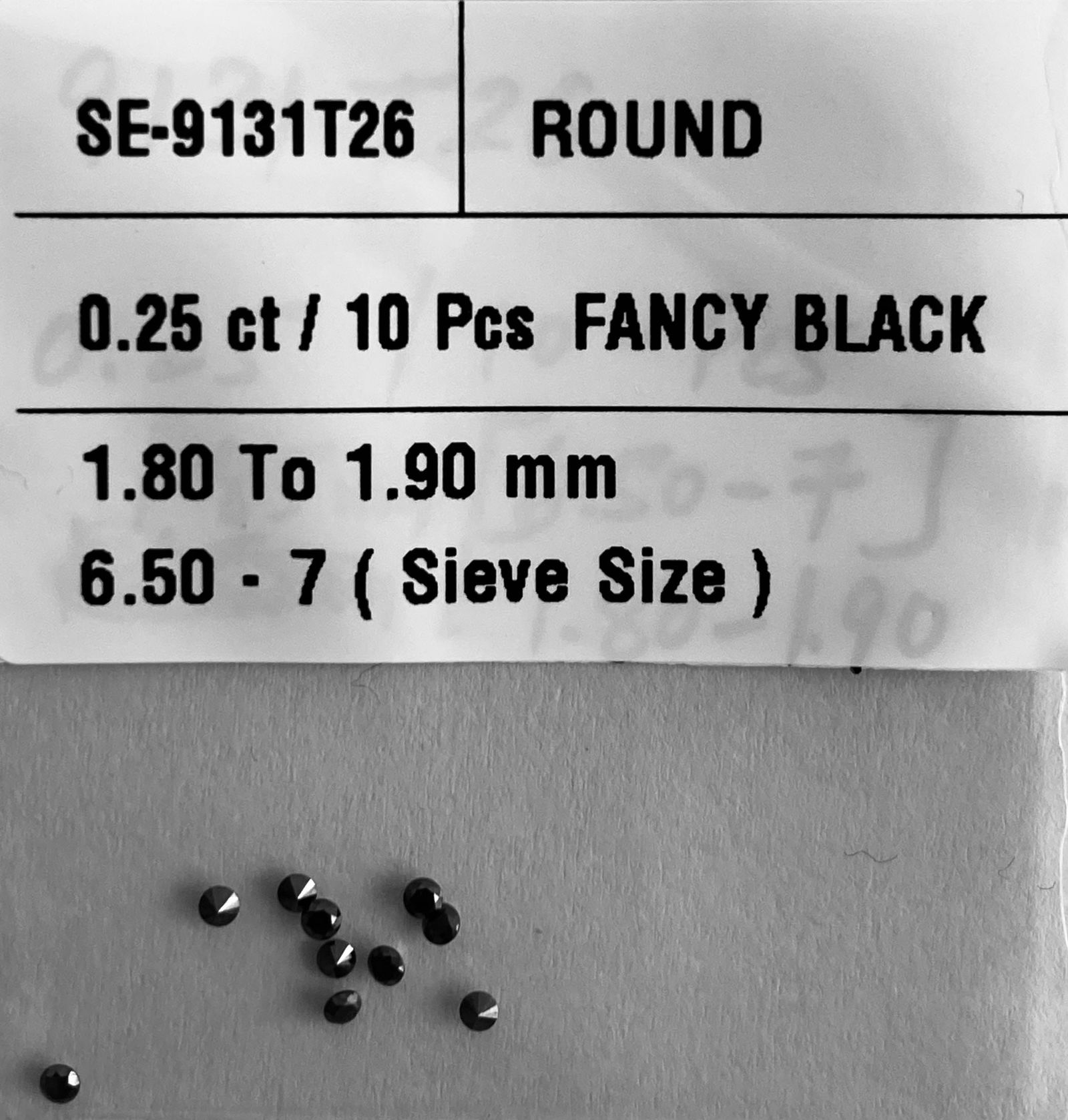 Loose Diamond - ROUND 0.25ct Fancy Black VVS2: Loose Diamond - ROUND 0.25ct Fancy Black VVS2 Source: Natural Shape: ROUND Carats: 0.25 Color: Fancy Black Certification: NONE The Diamond Depot Guarantee: All items in this auction are guaranteed
