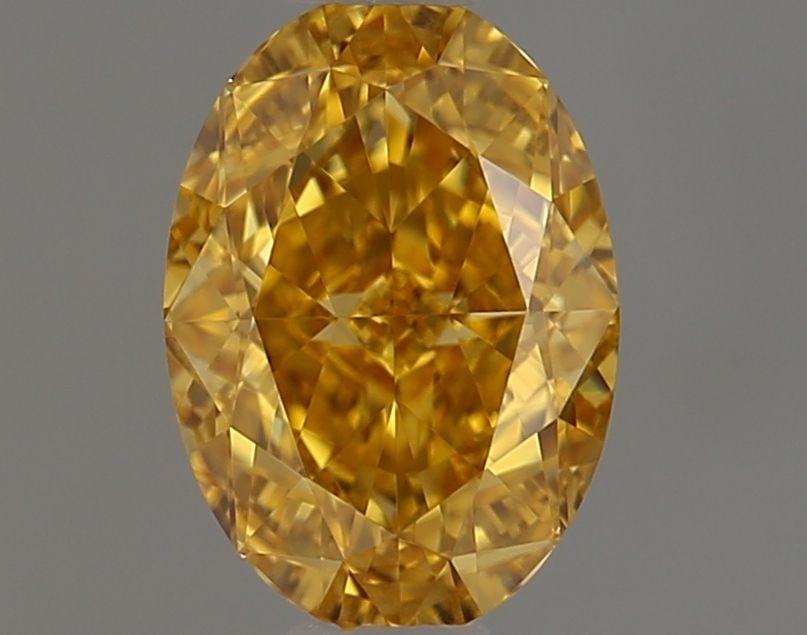 Loose Diamond - OVAL 0.59ct Fancy Vivid Orange Yellow VVS2: Loose Diamond - OVAL 0.59ct Fancy Vivid Orange Yellow VVS2 Source: Natural Shape: OVAL Carats: 0.59 Color: Fancy Vivid Orange Yellow Certification: GIA Video: