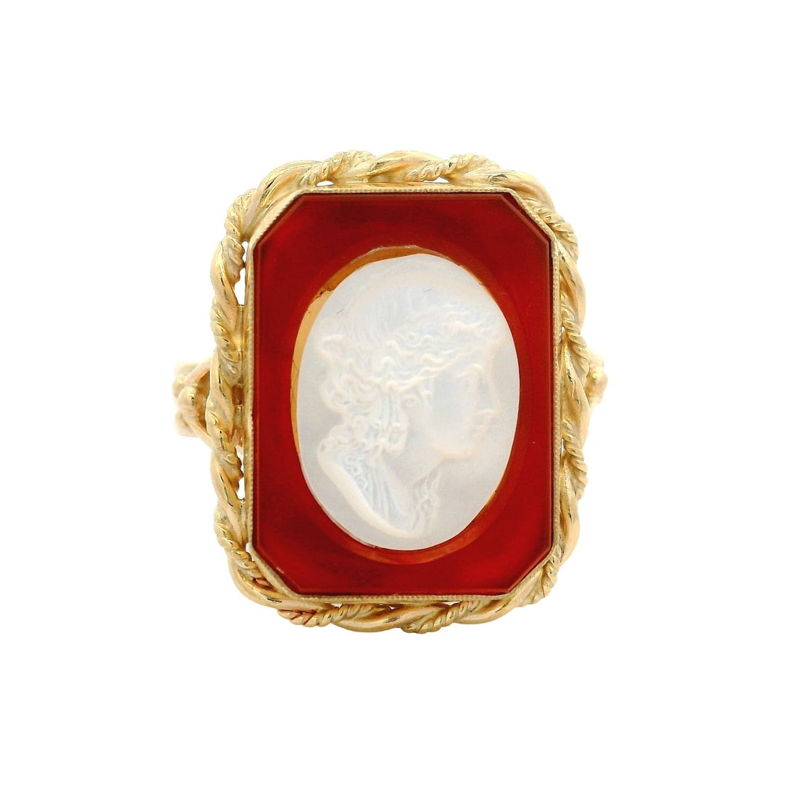 14k Yellow Gold Twisted Rope Ring with Carnelian and Mother of Pearl Cameo: 14k Yellow Gold Twisted Rope Ring with Carnelian and Mother of Pearl Cameo This exquisite ring features a stunning combination of natural gemstones and high-quality materials. The centerpiece is a gen