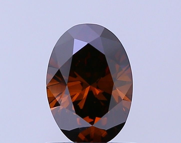 Loose Diamond - OVAL 1.06ct Fancy Reddish Brown VVS2: Loose Diamond - OVAL 1.06ct Fancy Reddish Brown VVS2 Source: Natural Shape: OVAL Carats: 1.06 Color: Fancy Reddish Brown Certification: NONE Video: