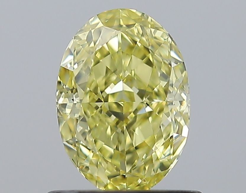 Loose Diamond - OVAL 0.88ct Fancy Yellow VVS1: Loose Diamond - OVAL 0.88ct Fancy Yellow VVS1 Source: Natural Shape: OVAL Carats: 0.88 Color: Fancy Yellow Certification: GIA Video: