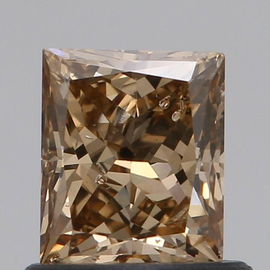 Loose Diamond - PRINCESS 0.8ct Fancy Brown SI2: Loose Diamond - PRINCESS 0.8ct Fancy Brown SI2 Source: Natural Shape: PRINCESS Carats: 0.8 Color: Fancy Brown Certification: NONE Video: