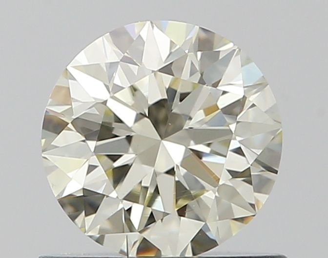 Loose Diamond - ROUND 0.71ct K VS1: Loose Diamond - ROUND 0.71ct K VS1 Source: Natural Shape: ROUND Carats: 0.71 Color: K Clarity: VS1 Certification: IGI Video: