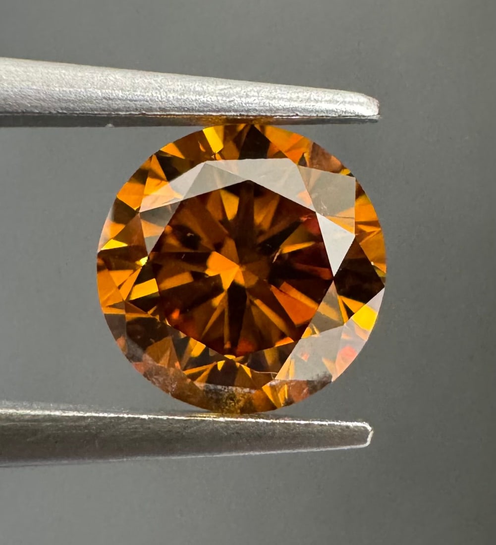 Loose Diamond - ROUND 0.8ct Fancy Deep Brownish Yellowish Orange SI2: Loose Diamond - ROUND 0.8ct Fancy Deep Brownish Yellowish Orange SI2 Source: Natural Shape: ROUND Carats: 0.8 Color: Fancy Deep Brownish Yellowish Orange Certification: GIA The Diamond Depot Guarantee