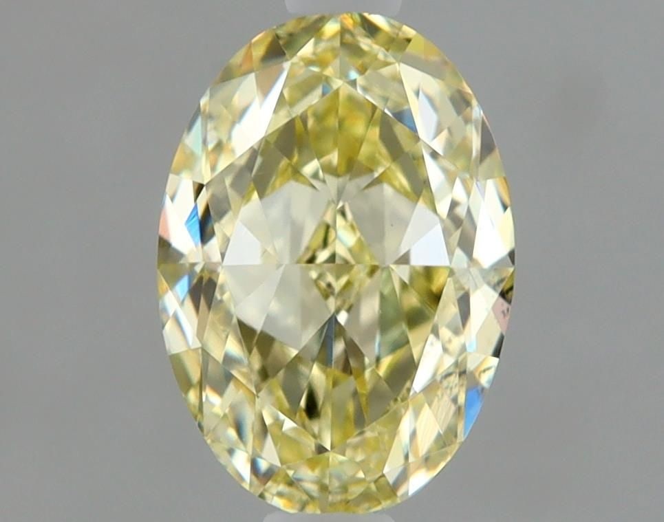 Loose Diamond - OVAL 1.0ct Fancy Light Yellow VS2: Loose Diamond - OVAL 1.0ct Fancy Light Yellow VS2 Source: Natural Shape: OVAL Carats: 1.0 Color: Fancy Light Yellow Certification: GIA Video: