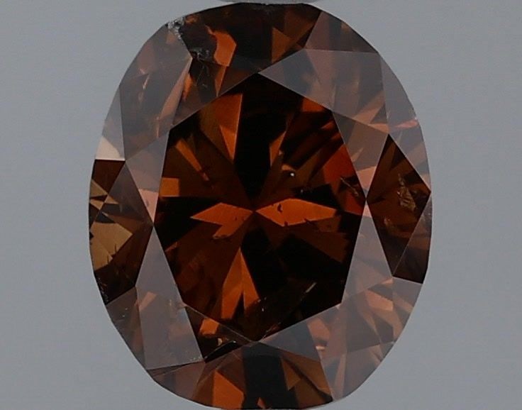 Loose Diamond - OVAL 1.05ct Fancy Dark Orangey Brown: Loose Diamond - OVAL 1.05ct Fancy Dark Orangey Brown Source: Natural Shape: OVAL Carats: 1.05 Color: Fancy Dark Orangey Brown Certification: GIA Video: