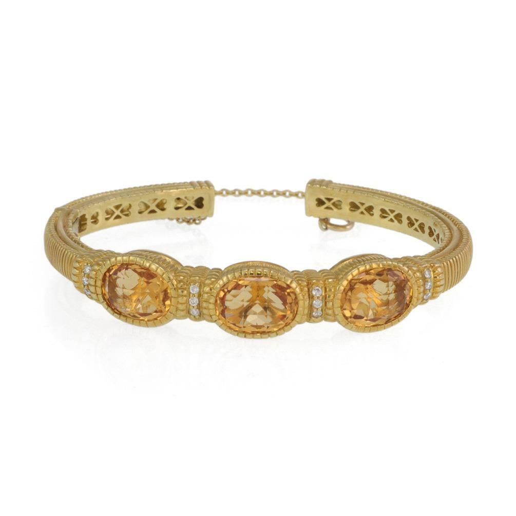 Judith Ripka 18k Yellow Gold Cuff Bracelet with Orange Citrine and Diamond Accents: Judith Ripka 18k Yellow Gold Cuff Bracelet with Orange Citrine and Diamond Accents This exquisite cuff bracelet by Judith Ripka showcases a stunning design crafted from 18k yellow gold with a textured