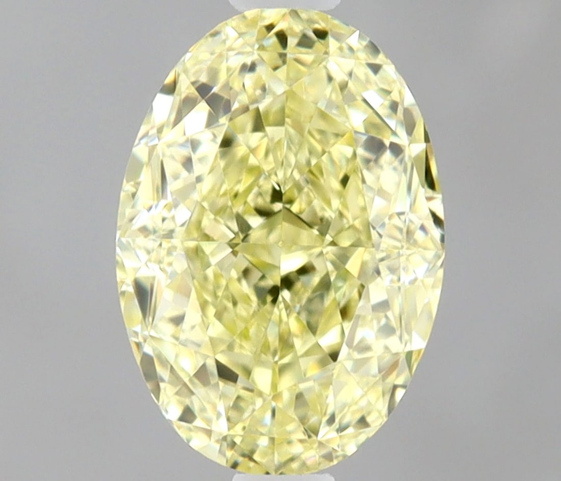 Loose Diamond - OVAL 0.7ct Fancy Yellow VVS2: Loose Diamond - OVAL 0.7ct Fancy Yellow VVS2 Source: Natural Shape: OVAL Carats: 0.7 Color: Fancy Yellow Certification: GIA Video: