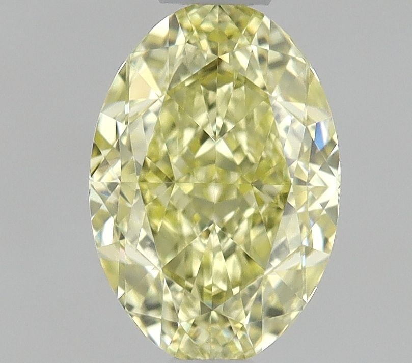Loose Diamond - OVAL 0.67ct Fancy Yellow IF: Loose Diamond - OVAL 0.67ct Fancy Yellow IF Source: Natural Shape: OVAL Carats: 0.67 Color: Fancy Yellow Certification: GIA The Diamond Depot Guarantee: All items in this auction are guaranteed to be