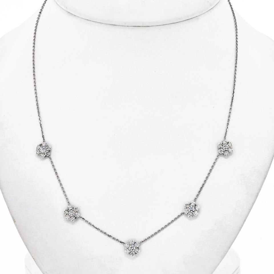 Van Cleef & Arpels 18K White Gold Diamond Fleurette Necklace: Van Cleef & Arpels 18K White Gold Diamond Fleurette Necklace This exquisite Van Cleef & Arpels necklace features a stunning "Fleurette" design crafted from luxurious 18K white gold. The necklace showc