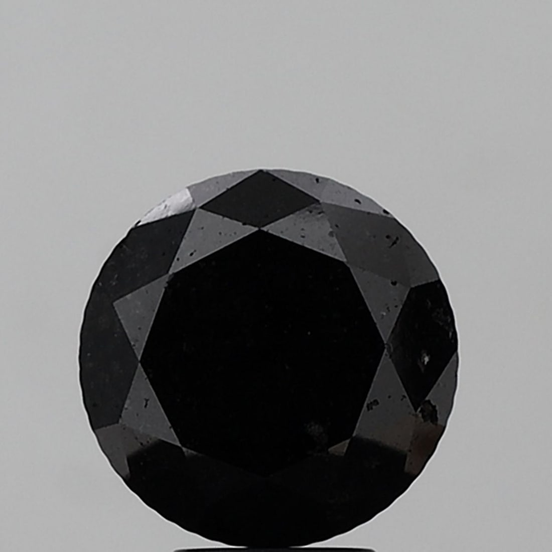 Loose Diamond - ROUND 6.33ct Fancy Black I1: Loose Diamond - ROUND 6.33ct Fancy Black I1 Source: Natural Shape: ROUND Carats: 6.33 Color: Fancy Black Certification: NONE Video: