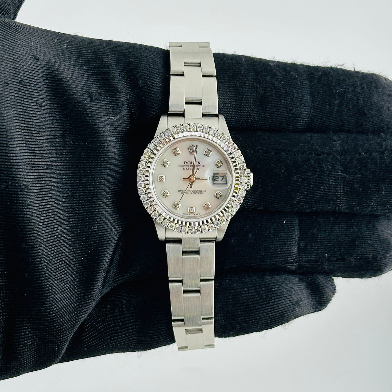 Ladies Rolex Datejust 79190 Oyster Bracelet White MOP Diamond Dial: Ladies Rolex Datejust 79190 Oyster Bracelet White MOP Diamond Dial This ladies' Rolex Datejust features an after-market white mother-of-pearl diamond dial, complemented by a prong-set diamond bezel. T