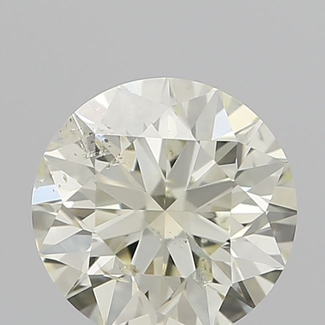 Loose Diamond - ROUND 0.51ct O-P SI2: Loose Diamond - ROUND 0.51ct O-P SI2 Source: Natural Shape: ROUND Carats: 0.51 Color: O-P Certification: IGI Video:
