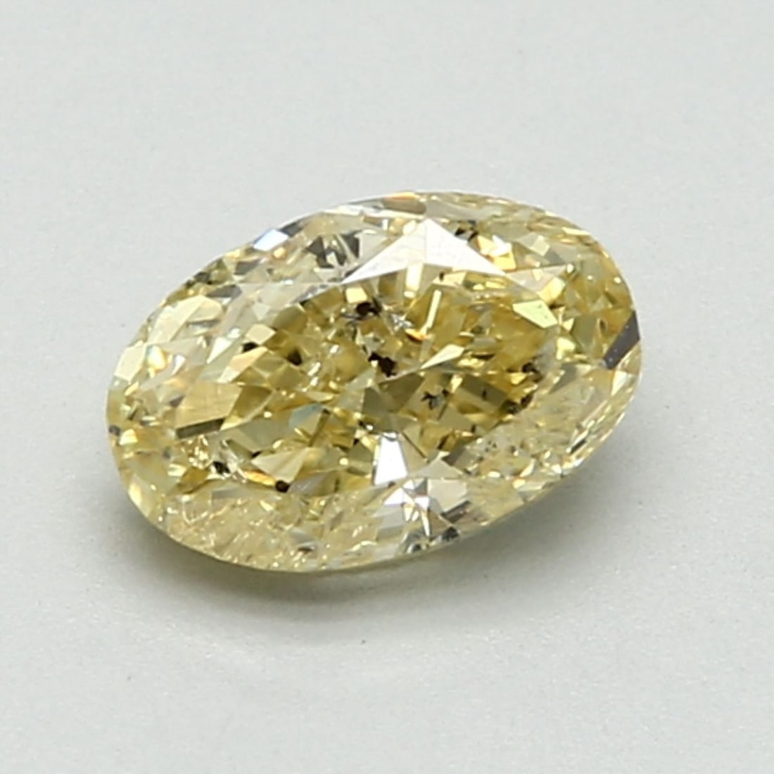 Loose Diamond - OVAL 1.23ct Fancy Intense Yellow: Loose Diamond - OVAL 1.23ct Fancy Intense Yellow Source: Natural Shape: OVAL Carats: 1.23 Color: Fancy Intense Yellow Certification: GIA The Diamond Depot Guarantee: All items in this auction are guar