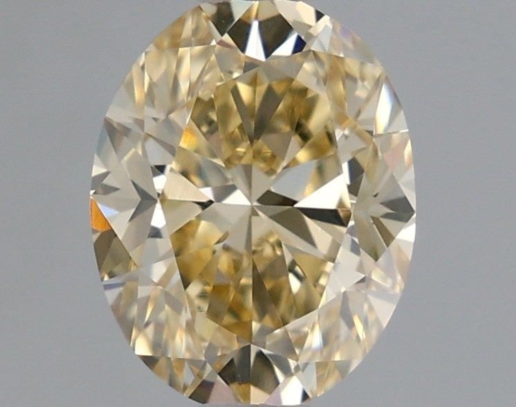 Loose Diamond - OVAL 1.02ct Fancy Light Orangey Yellow VVS2: Loose Diamond - OVAL 1.02ct Fancy Light Orangey Yellow VVS2 Source: Natural Shape: OVAL Carats: 1.02 Color: Fancy Light Orangey Yellow Certification: GIA Video: