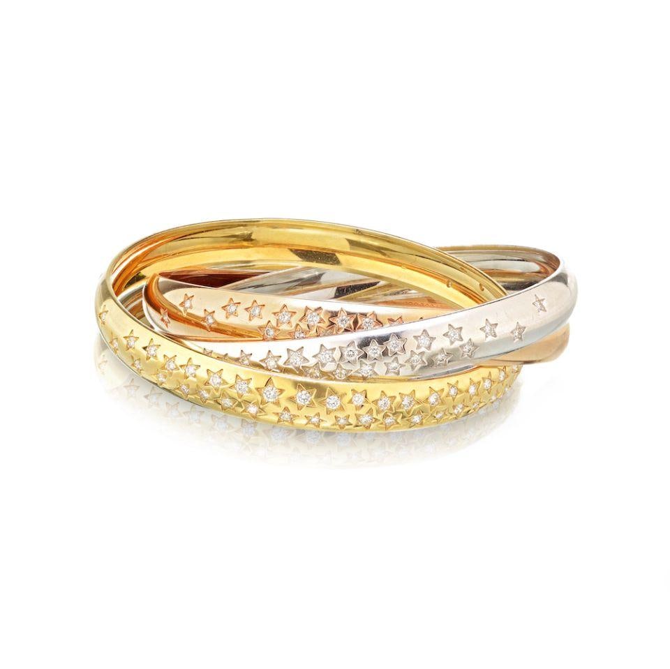 Cartier Trinity 18K Two Tone Diamond Bangle Bracelet 100th Anniversary: Cartier Trinity 18K Two Tone Diamond Bangle Bracelet 100th Anniversary This exquisite Cartier Trinity bangle bracelet is crafted from 18K two-tone gold and features a stunning tri-color design. Celebr