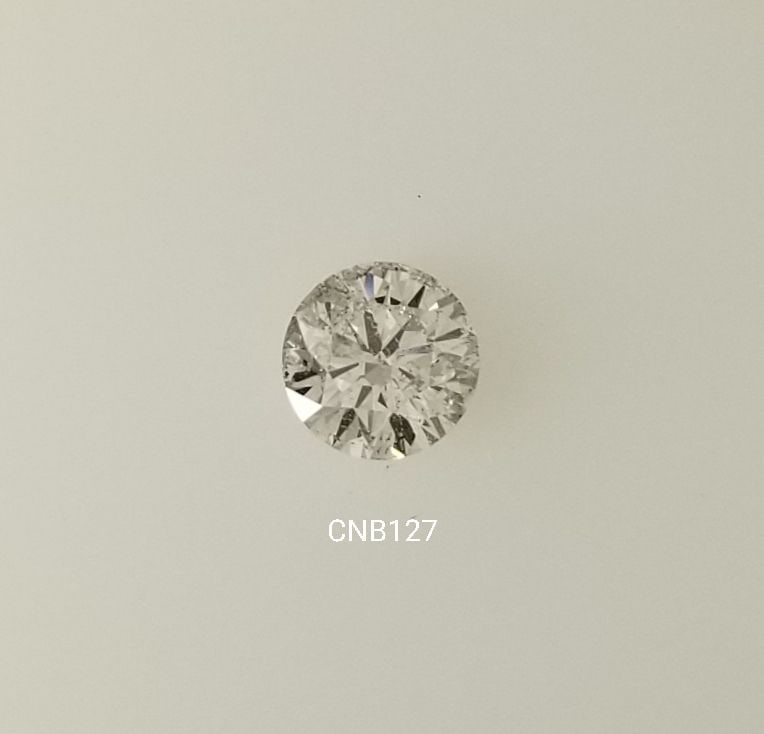 Loose Diamond - ROUND 0.58ct Very Light Champagne I1: Loose Diamond - ROUND 0.58ct Very Light Champagne I1 Source: Natural Shape: ROUND Carats: 0.58 Color: Very Light Champagne Certification: NONE The Diamond Depot Guarantee: All items in this auction ar